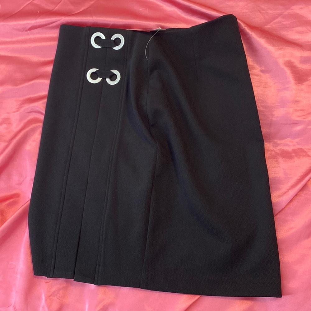 Reitman’s black pencil skirt with silver details